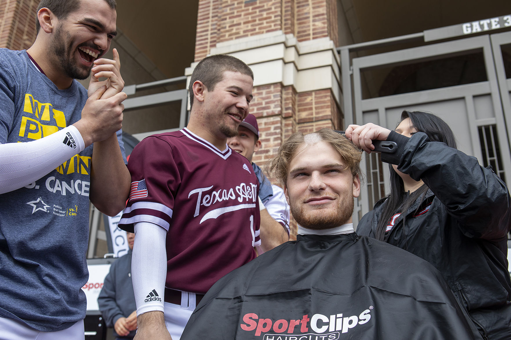 A&M baseball head shaving for cancer